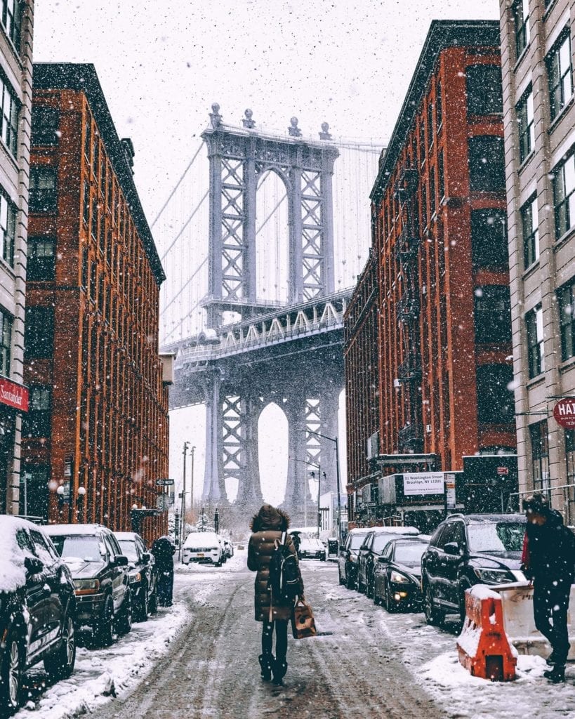 A photo of a lady walking in Brooklyn, New York City